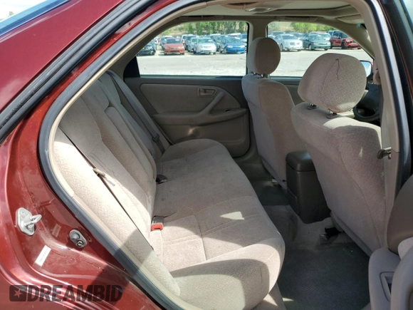2001 Toyota Camry LE z VIN 4T1BF28K51U124747, wystawiony jako Copart lot #57482825 z przebiegiem 108 262 mil mil oraz Szkoda całkowita • Salvage title. Historia ofert i sprzedaży dostępna na DreamBid. Obrazek 10.