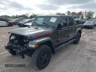 2022 Jeep Gladiator Texas Trail z VIN 1C6HJTAG0NL162804, wystawiony jako IAAI lot #41524087 z przebiegiem 17 652 mil mil oraz . Historia ofert i sprzedaży dostępna na DreamBid. Obrazek 2.