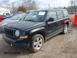 2013 Jeep Patriot Latitude with VIN 1C4NJPFA7DD213134, listed as a IAAI auction lot 41472480 with 176,068 mi miles. Bid and sale history available at carsss.com. Image 2.