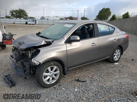 2012 Nissan Versa SL with VIN 3N1CN7AP9CL931299, listed as a Copart auction lot 51016705 with 153,723 mi miles and Salvage title. Bid and sale history available at DreamBid. Image 1.