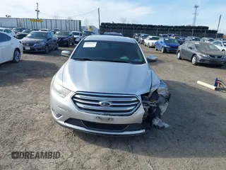 2014 Ford Taurus Limited with VIN 1FAHP2F86EG134779, listed as a IAAI auction lot 41660527 with 115,016 mi miles. Bid and sale history available at carsss.com. Image 12.