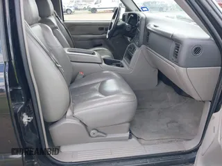 2004 Chevrolet Tahoe Z71 with VIN 1GNEK13ZX4R184775, listed as a IAAI auction lot 42433671 with 77,019 mi miles and . Bid and sale history available at DreamBid. Image 5.
