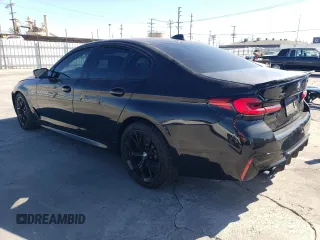 2023 BMW 5 Series M550i xDrive with VIN WBA13BK03PCM44838, listed as a Copart auction lot 68434874 with 17,798 mi miles and Salvage title. Bid and sale history available at DreamBid. Image 2.