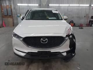 2017 Mazda CX-5 Touring with VIN JM3KFBCL9H0107589, listed as a IAAI auction lot 41241481 with 77,032 mi miles. Bid and sale history available at carsss.com. Image 12.