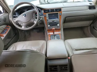 2004 Acura RL w/Navigation System z VIN JH4KA96664C007799, wystawiony jako Copart lot #44207245 z przebiegiem 215 098 mil mil oraz Szkoda całkowita • Salvage title. Historia ofert i sprzedaży dostępna na DreamBid. Obrazek 8.
