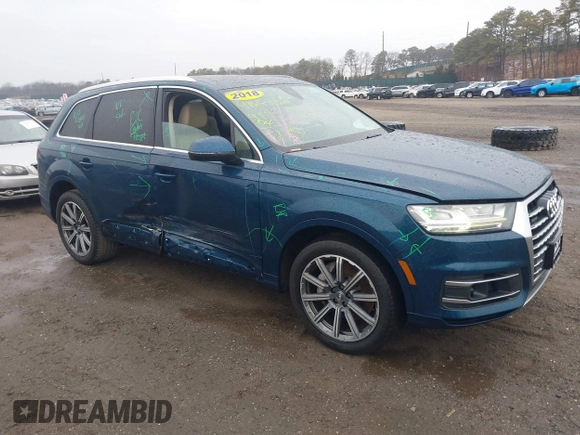 2018 Audi Q7 Premium Plus z VIN WA1LAAF77JD026085, wystawiony jako IAAI lot #41683329 z przebiegiem 91 404 mil mil oraz . Historia ofert i sprzedaży dostępna na DreamBid. Obrazek 1.