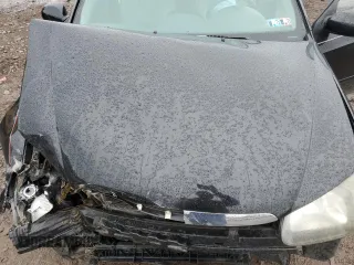 2009 Kia Spectra EX with VIN KNAFE222495648220, listed as a Copart auction lot 52886915 with 146,417 mi miles and Salvage title. Bid and sale history available at DreamBid. Image 12.