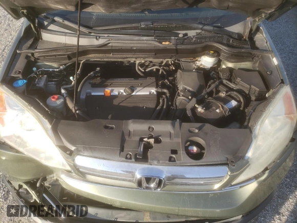 2009 Honda CR-V EX-L z VIN 5J6RE48769L000933, wystawiony jako Copart lot #49715475 z przebiegiem 207 035 mil mil oraz Szkoda całkowita • Salvage title. Historia ofert i sprzedaży dostępna na DreamBid. Obrazek 13.