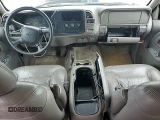 1999 Chevrolet Tahoe Z71 with VIN 1GNEK13R1XJ365475, listed as a Copart auction lot 56258175 with 184,647 mi miles and Clean Title. Bid and sale history available at DreamBid. Image 8.