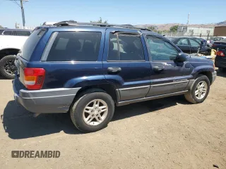 2004 Jeep Grand Cherokee Laredo with VIN 1J4GW48S34C343281, listed as a Copart auction lot 63253325 with 247,697 mi miles and Clean title. Bid and sale history available at DreamBid. Image 3.