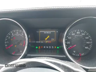 2015 Ford Mustang EcoBoost with VIN 1FA6P8TH9F5317329, listed as a IAAI auction lot 41966041 with 61,357 mi miles and . Bid and sale history available at carsss.com. Image 7.