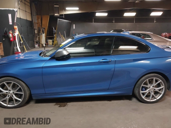 2016 BMW 2 Series M235i with VIN WBA1J7C58GV360712, listed as a IAAI auction lot 41975610 with 18,258 mi miles. Bid and sale history available at carsss.com. Image 14.