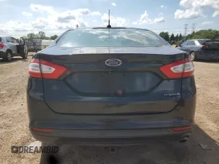 2013 Ford Fusion SE Hybrid с VIN 3FA6P0LU2DR181215, выставлен на аукционе Copart как лот 62474965 с пробегом 149 492 миль миль и Списание • Salvage title. История ставок и продаж доступна на DreamBid. Изображение 6.