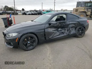 2014 BMW 4 Series 428i with VIN WBA3N7C58EF719741, listed as a Copart auction lot 81573274 with 113,095 mi miles and Salvage Title. Bid and sale history available at carsss.com. Image 1.