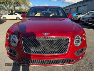 2017 Bentley Bentayga W12 z VIN SJAAC2ZV1HC014037, wystawiony jako Copart lot #54799655 z przebiegiem 36 099 mil mil oraz Szkody całkowita. Historia ofert i sprzedaży dostępna na DreamBid. Obrazek 5.