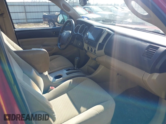 2009 Toyota Tacoma PreRunner with VIN 3TMJU62N69M086123, listed as a IAAI auction lot 41693360 with 221,033 mi miles. Bid and sale history available at carsss.com. Image 5.