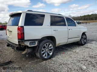 2015 Chevrolet Tahoe LTZ with VIN 1GNSCCKC9FR143064, listed as a Copart auction lot 45360745 with 140,751 mi miles and Salvage Title. Bid and sale history available at carsss.com. Image 3.