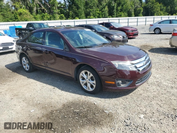 2012 Ford Fusion SE with VIN 3FAHP0HA0CR291458, listed as a Copart auction lot 63357165 with 122,992 mi miles and Salvage title. Bid and sale history available at DreamBid. Image 4.