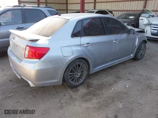2012 Subaru Impreza Sedan WRX WRX Premium with VIN JF1GV7F67CG029694, listed as a IAAI auction lot 41876255 with 118,383 mi miles. Bid and sale history available at carsss.com. Image 4.