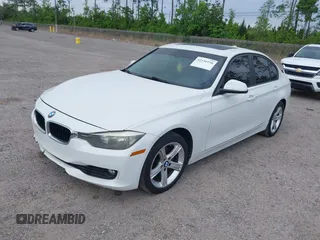 2015 BMW 3 Series 328i with VIN WBA3A5C50FF608327, listed as a IAAI auction lot 42136156 with 213,945 mi miles. Bid and sale history available at carsss.com. Image 17.