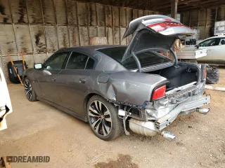 2012 Dodge Charger SRT8 with VIN 2C3CDXEJ1CH240058, listed as a Copart auction lot 73943004 with 72,013 mi miles and Salvage Title. Bid and sale history available at carsss.com. Image 2.