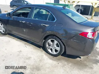 2010 Acura TSX with VIN JH4CU2F63AC003630, listed as a IAAI auction lot 42002216 with 131,244 mi miles. Bid and sale history available at carsss.com. Image 6.