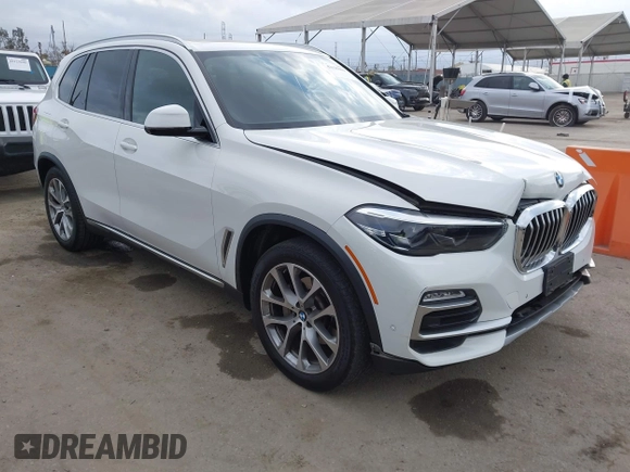 2021 BMW X5 xDrive40i with VIN 5UXCR6C03M9G36156, listed as a IAAI auction lot 42125009 with 30,877 mi miles. Bid and sale history available at carsss.com. Image 1.