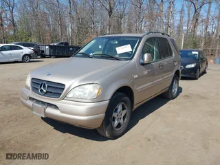 2001 Mercedes-Benz M-Class with VIN 4JGAB54E91A251754, listed as a IAAI auction lot 41784883 with 148,288 mi miles. Bid and sale history available at carsss.com. Image 2.