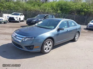 2012 Ford Fusion SE with VIN 3FAHP0HAXCR228318, listed as a IAAI auction lot 42048711 with 76,700 mi miles. Bid and sale history available at carsss.com. Image 2.