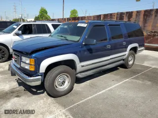 1997 GMC Suburban with VIN 1GKGK26J7VJ748464, listed as a Copart auction lot 52597135 with 176,109 mi miles and Salvage Title. Bid and sale history available at carsss.com. Image 1.