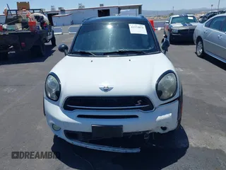 2015 MINI Countryman S with VIN WMWZC3C58FWT05613, listed as a IAAI auction lot 42374870 with 124,214 mi miles and . Bid and sale history available at DreamBid. Image 11.