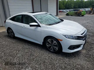 2017 Honda Civic EX-L z VIN 19XFC1F74HE014241, wystawiony jako Copart lot #59005745 z przebiegiem 55 629 mil mil oraz Czysty tytuł • Clean title. Historia ofert i sprzedaży dostępna na DreamBid. Obrazek 4.