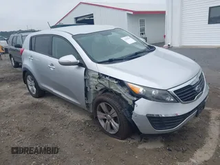 2012 Kia Sportage LX with VIN KNDPB3A21C7327416, listed as a IAAI auction lot 42430249 with 95,471 mi miles and . Bid and sale history available at DreamBid. Image 1.