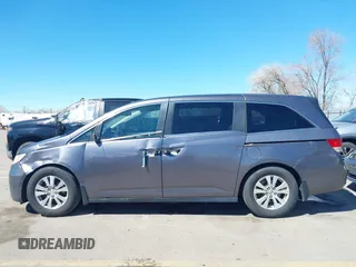 2015 Honda Odyssey EX-L with VIN 5FNRL5H66FB063215, listed as a IAAI auction lot 41846532 with 153,048 mi miles and . Bid and sale history available at carsss.com. Image 15.