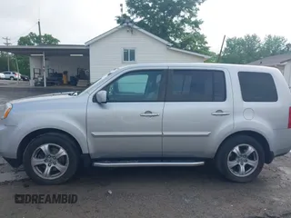 2015 Honda Pilot EX-L with VIN 5FNYF4H5XFB014653, listed as a IAAI auction lot 42121003 with 152,912 mi miles and . Bid and sale history available at carsss.com. Image 15.
