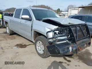 2016 Chevrolet Silverado 1500 LT with VIN 1GCUKREC9GF229979, listed as a IAAI auction lot 41859015 with 110,821 mi miles and . Bid and sale history available at DreamBid. Image 1.