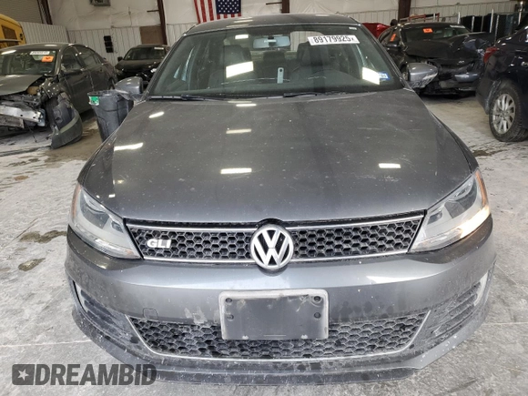 2014 Volkswagen Jetta GLI z VIN 3VW4T7AJ6EM398115, wystawiony jako Copart lot #89179925 z przebiegiem 81 264 mil mil oraz Szkoda całkowita • Salvage title. Historia ofert i sprzedaży dostępna na DreamBid. Obrazek 5.