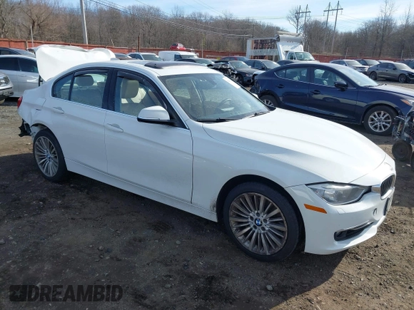 2014 BMW 3 Series 335i xDrive with VIN WBA3B9C52EJ466045, listed as a IAAI auction lot 41281384 with 136,329 mi miles. Bid and sale history available at carsss.com. Image 1.