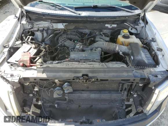 2014 Ford F-150 XL with VIN 1FTMF1CM7EKD02336, listed as a Copart auction lot 57333815 with 126,053 mi miles and Salvage title. Bid and sale history available at DreamBid. Image 11.
