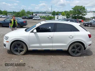 2015 Audi Q3 Premium Plus z VIN WA1EFCFS8FR001278, wystawiony jako IAAI lot #42475043 z przebiegiem 125 417 mil mil oraz . Historia ofert i sprzedaży dostępna na DreamBid. Obrazek 15.