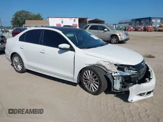 2013 Volkswagen Jetta TDI w/Premium/Nav z VIN 3VWLL7AJXDM392313, wystawiony jako IAAI lot #42370151 z przebiegiem 98 618 mil mil oraz . Historia ofert i sprzedaży dostępna na DreamBid. Obrazek 1.