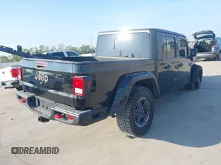 2023 Jeep Gladiator Rubicon z VIN 1C6JJTBGXPL543787, wystawiony jako IAAI lot #40963799 z przebiegiem 5 402 mil mil oraz . Historia ofert i sprzedaży dostępna na DreamBid. Obrazek 4.