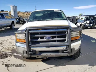 2000 Ford F-350 XL with VIN 1FTSW31F5YEA50810, listed as a Copart auction lot 83274144 with 147,370 mi miles and Salvage Title. Bid and sale history available at DreamBid. Image 5.