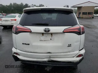 2018 Toyota RAV4 LE with VIN 2T3BFREV2JW853108, listed as a Copart auction lot 61245795 with 174,196 mi miles and Salvage title. Bid and sale history available at DreamBid. Image 6.