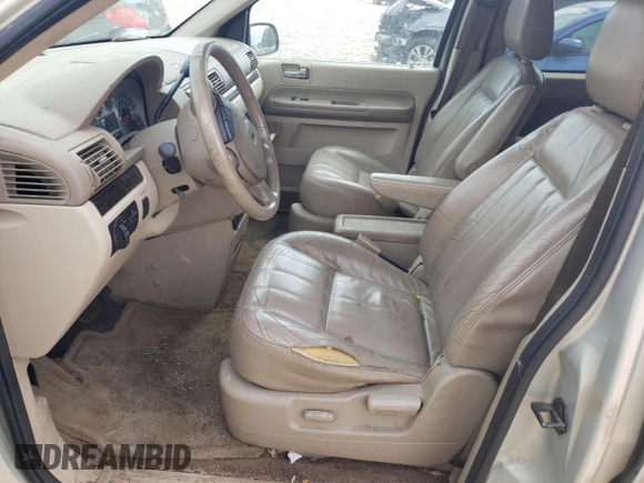 2004 Mercury Monterey Convenience z VIN 2MRDA20204BJ12195, wystawiony jako Copart lot #71349394 z przebiegiem Nie podano mil oraz Szkody całkowita. Historia ofert i sprzedaży dostępna na DreamBid. Obrazek 7.