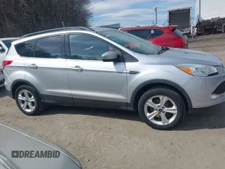 2016 Ford Escape SE with VIN 1FMCU9GXXGUB10447, listed as a IAAI auction lot 41879610 with 137,913 mi miles. Bid and sale history available at carsss.com. Image 13.