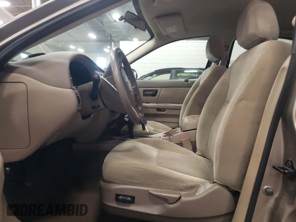 2005 Ford Taurus SE with VIN 1FAFP53U15A276082, listed as a Copart auction lot 52015285 with 103,479 mi miles and Salvage Title. Bid and sale history available at carsss.com. Image 7.