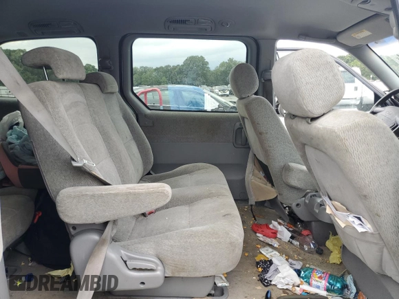 2005 Kia Sedona LX with VIN KNDUP132856712907, listed as a Copart auction lot 75751424 with 177,893 mi miles and Salvage Title. Bid and sale history available at carsss.com. Image 11.