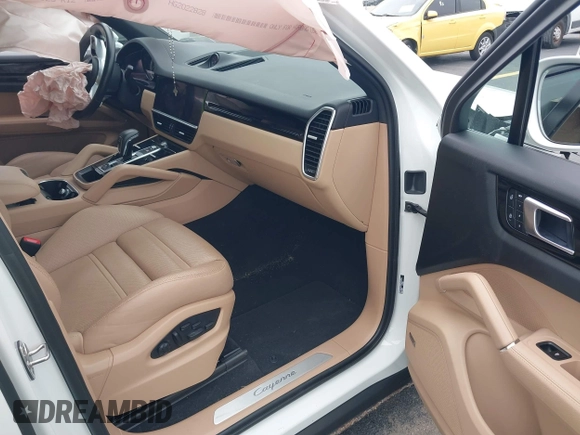 2023 Porsche Cayenne with VIN WP1BA2AY2PDA26896, listed as a IAAI auction lot 42434506 with 10,577 mi miles and . Bid and sale history available at DreamBid. Image 5.