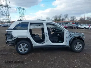 2023 Jeep Grand Cherokee Altitude with VIN 1C4RJHAG8PC570075, listed as a IAAI auction lot 41361535 with 70,720 mi miles and . Bid and sale history available at DreamBid. Image 13.